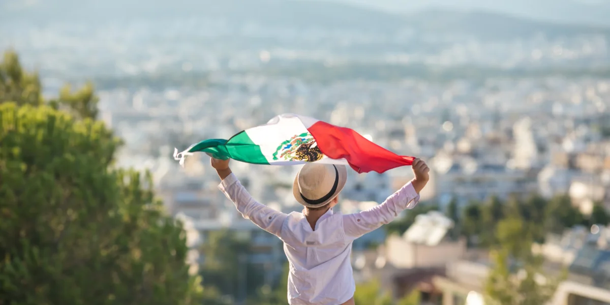 people-holding-flag-of-mexico-september-16-inde-2022-11-16-08-34-52-utc